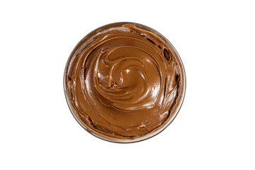 Glass bowl with delicious chocolate hazelnut spread isolated on white background. Top view