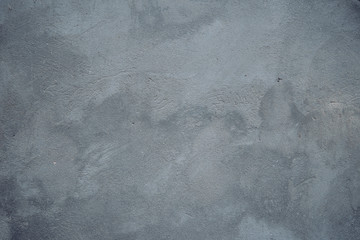 Textured antique peeled plaster. Background wall of concrete light gray tones in grunge style. The view from the top. The surface of the shooting table lay flat. Copy space