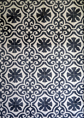 Fototapeta premium Dark blue and white ceramic tiles on wall in village in Andalusia