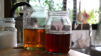 hot tea in glass jar in kitchen