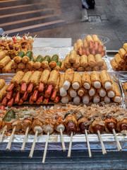 Street foods at Seoul, Korea: bread wrapped sausages