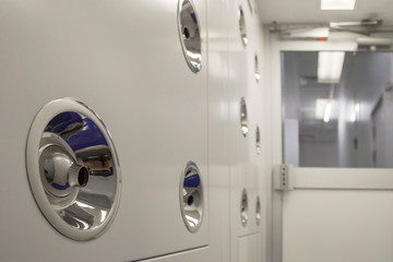 Entrance before of Clean rooms ,air shower for remove particles and dirty.