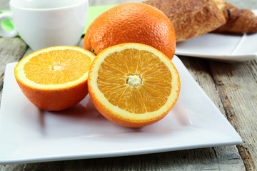 citrus fruits, oranges, grapefruit and lemon on a table
