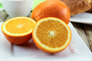 citrus fruits, oranges, grapefruit and lemon on a table