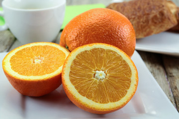 citrus fruits, oranges, grapefruit and lemon on a table