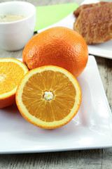 citrus fruits, oranges, grapefruit and lemon on a table