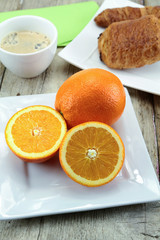 citrus fruits, oranges, grapefruit and lemon on a table