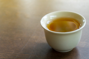 Hot tea in white ceramic cup