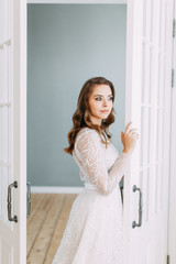 Beautiful girl in white dress, European wedding. Air and light photo shoot of the bride.