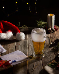 Santa Claus is working and drinking beer