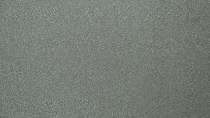 Black gray glitter background texture. Element of design.