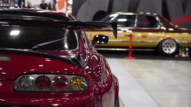 Japan red sport car rear light. Automobile tuning. Luxury coupe