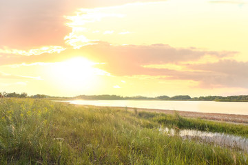 Picturesque landscape with beautiful lake on sunny day
