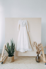 Stylish dress in European style. Details of the wedding dress, the morning and the bride's fees.