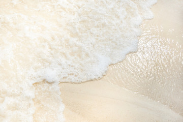 Soft wave of the sea on the sandy beach