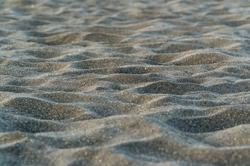 Close-up of dark beach sand in Iceland