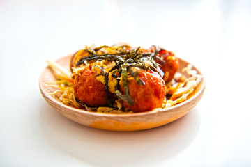 takoyaki, octopus balls, japanese food, In wooden plate on a white background, Popular Food in Thailand