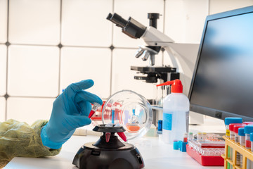 Young woman in food quality control lab