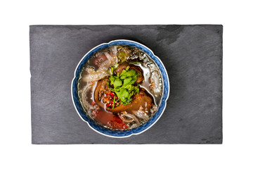 Oxtail soup, traditional muslim food with ox tail puree with spices isolated on white background - clipping paths