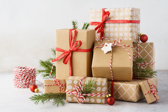 Christmas background with big heap of gift boxes and decoration.