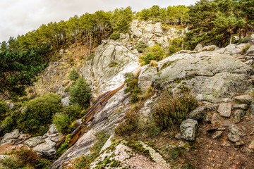 Fototapeta na wymiar Hornillo waterfall in the mountains of Madrid
