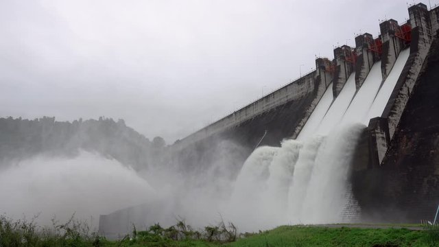 Dam with floodgate, Dam with water overflow, Spillway on the Khun Dan Prakan Chon Dam in thailand.	