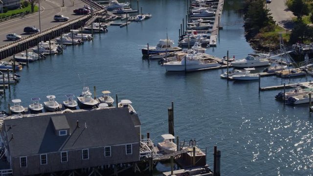 Cape Cod Massachusetts Aerial v6 Panning around looking down over Millway Marina detail - October 2017