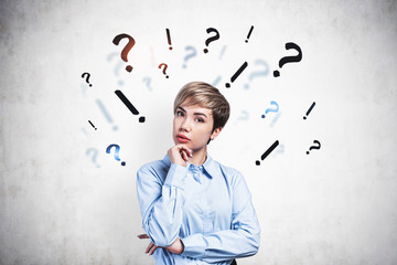 Pensive businesswoman looking for answers