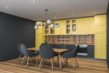 Gray and yellow kitchen corner with table