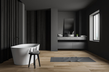 Gray and dark wood bathroom interior, side view