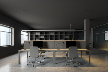 Dark gray open space office with bookcase