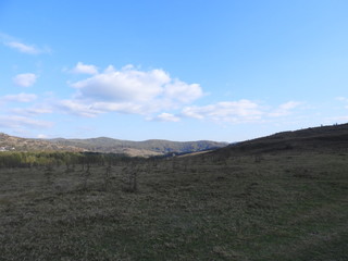 landscape with hills and clouds