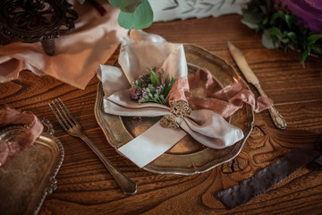 Beautiful food photo props, amazing table serving with fresh flowers, silver dish, knife and fork.