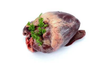raw pork heart on a white background