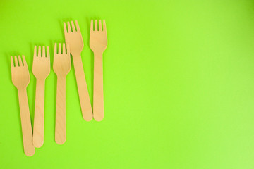 cutlery wooden, craft paper (eco friendly forks, plates, biodegradable materials) food containers eco packaging, menu concept. food background. copy space