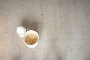Obraz na płótnie Canvas Eggs and coffee on a gray concrete table