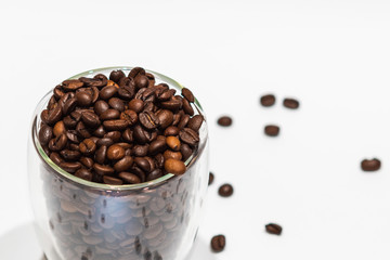 Coffee beans in cup and all around. Background. Texture