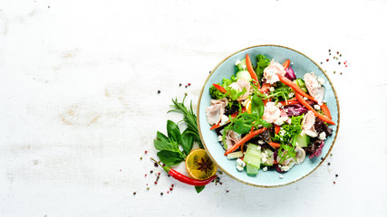 Fresh vegetable salad with chicken fillet. Food. Top view. Free space for your text.