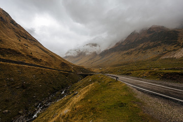 View of Transfagarash highway and valley in mountains of Romania. Tourist view mountain road