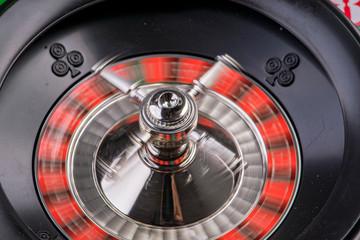 Roulette wheel spinning from above fuzzy