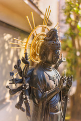 Fototapeta premium Bronze statue in the Togakuji temple of Tokyo depicting Japanese bodhisattva Jundei Kannon Bosatsu which is Goddess of Mercy.