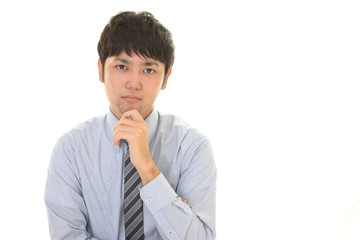 若いビジネスマン　考える