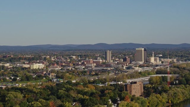 Springfield Massachusetts Aerial v2 Short panoramic view of Springfield cityscape from Brightwood vantage, low river view - October 2017
