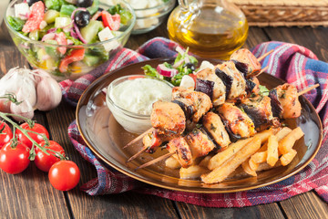 Chicken Souvlaki with french fries and tzatziki sauce