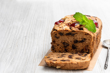 Mixed fruit loaf cake on wooden table