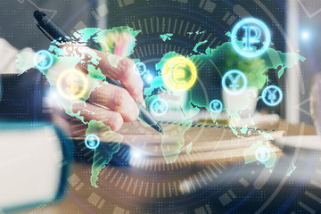 Financial forex charts displayed on woman's hand taking notes background. Concept of research....