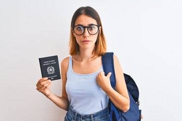 Beautiful redhead student woman wearing backpack and holding passport of italy with a confident expression on smart face thinking serious