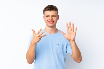 Young handsome man over isolated white background counting nine with fingers