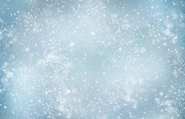 Decorative Christmas background with bokeh lights and snowflakes.