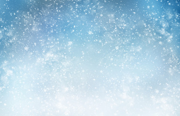 Decorative Christmas background with bokeh lights and snowflakes.